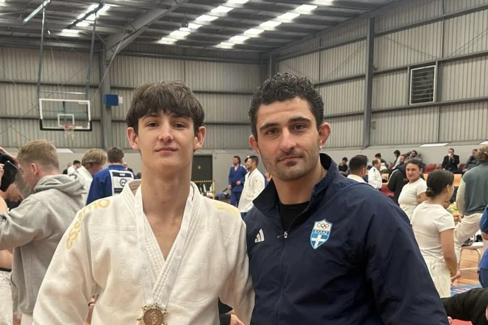 IIJC athlete with medal at competition